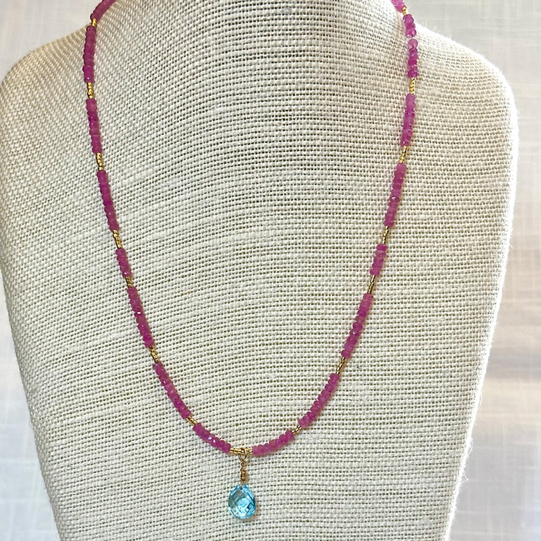 Pink sapphire and topaz necklace